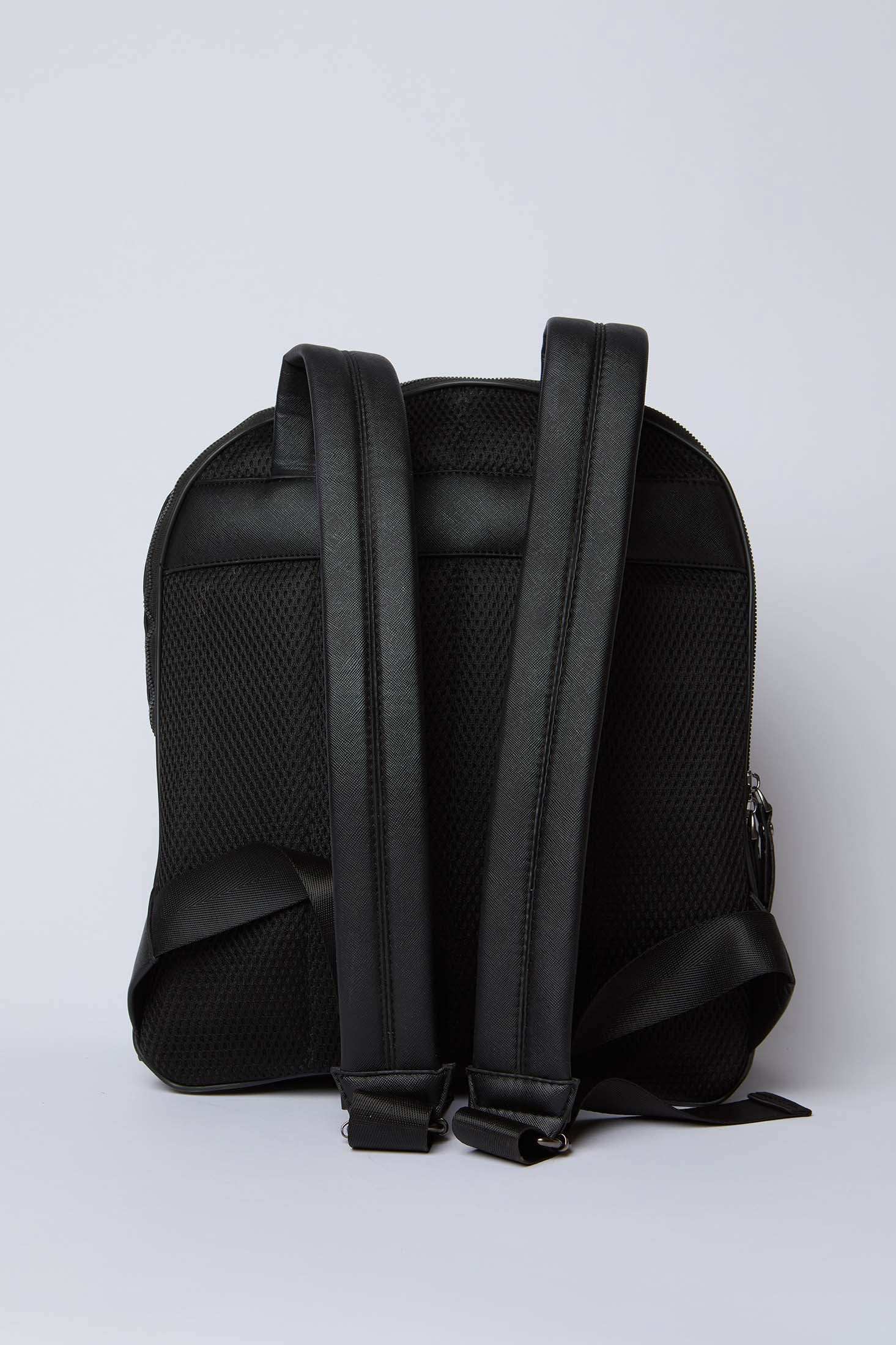 Dalydress black backpack with padded straps and mesh back, minimalist unisex design